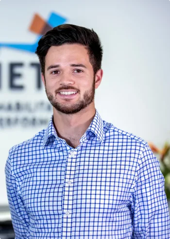 Physio Magill clinic scene showing physiotherapists providing sports physiotherapy, rehabilitation and physical therapy care.